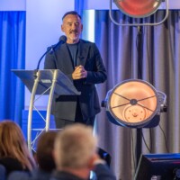 Brendan Courtney - Master of Ceremonies speaking at the National Older People's Council Convention 2025 at the Maldron Hotel, Tallaght