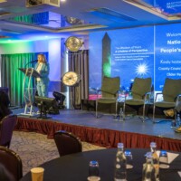 Moyah Murdoch - CE Insurance Ireland speaking at Day 2 of the National Older People's Council Convention 2025 at the Maldron Hotel, Tallaght